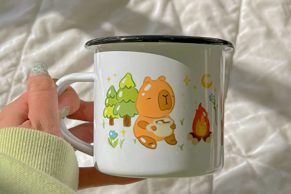 Uncomfy. Camper Capybara Enamel merch mug.